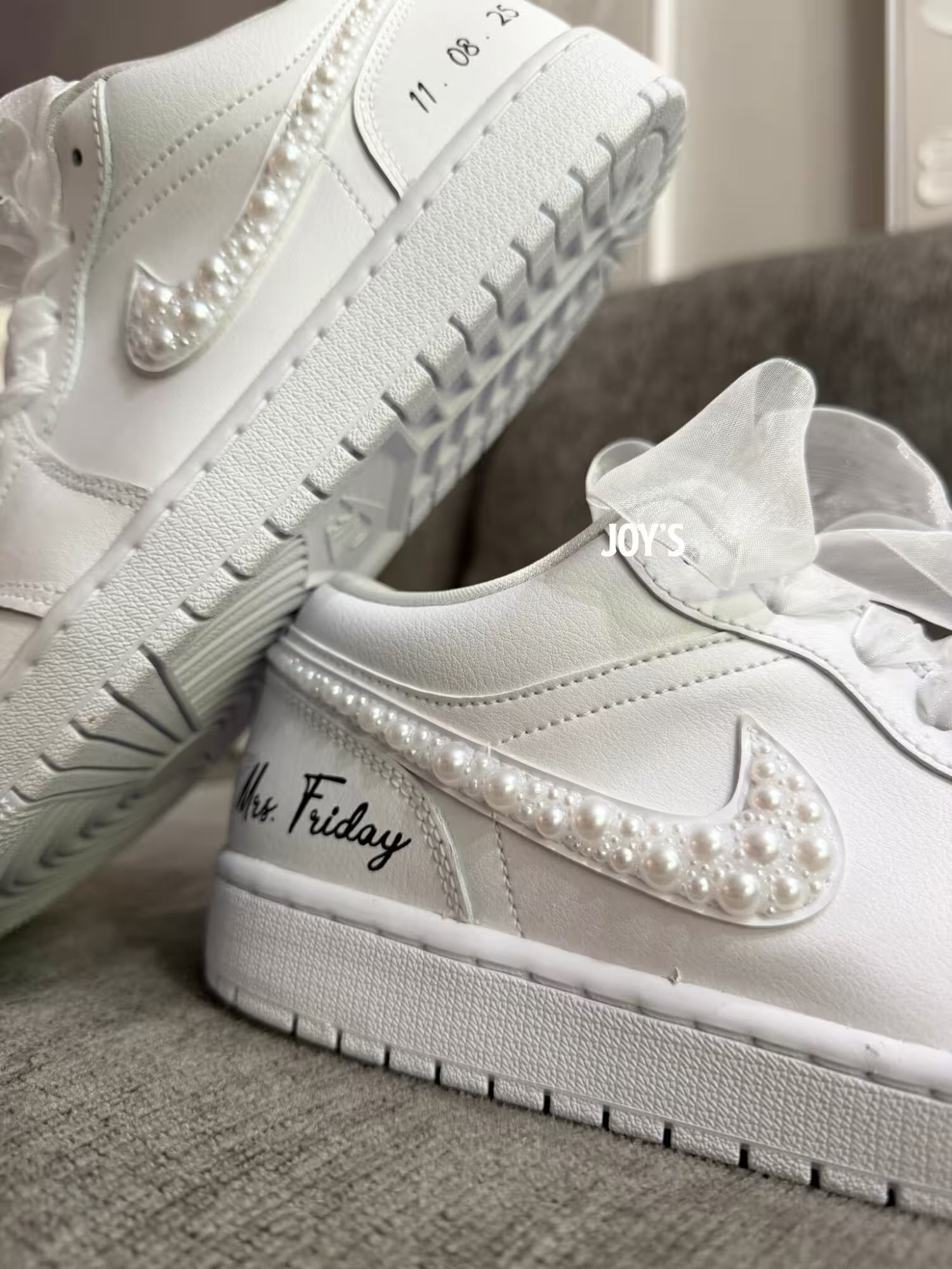 White wedding Jordan sneakers embellished with rhinestones, pearls, and subtle bling details
