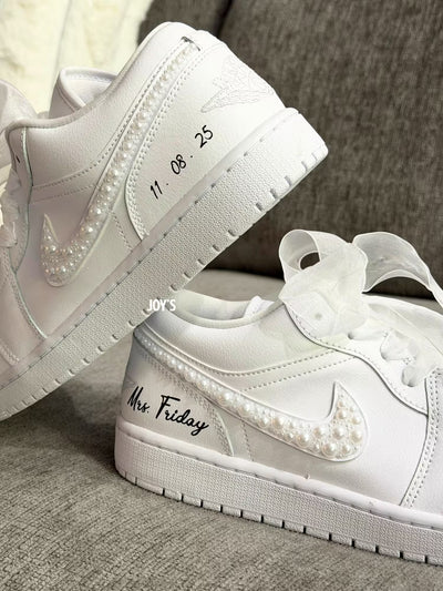 White wedding Jordan sneakers embellished with rhinestones, pearls, and subtle bling details