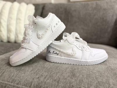 White wedding Jordan sneakers embellished with rhinestones, pearls, and subtle bling details