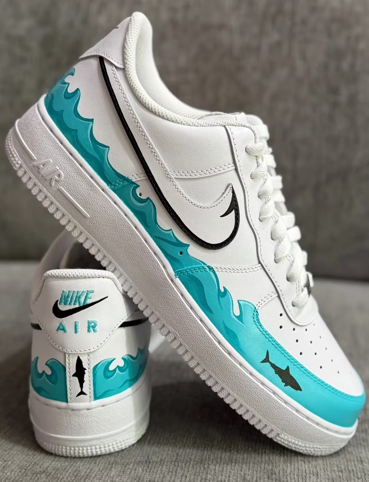 Hand-painted white Nike Air Force 1 sneakers with shark wave design for fishing